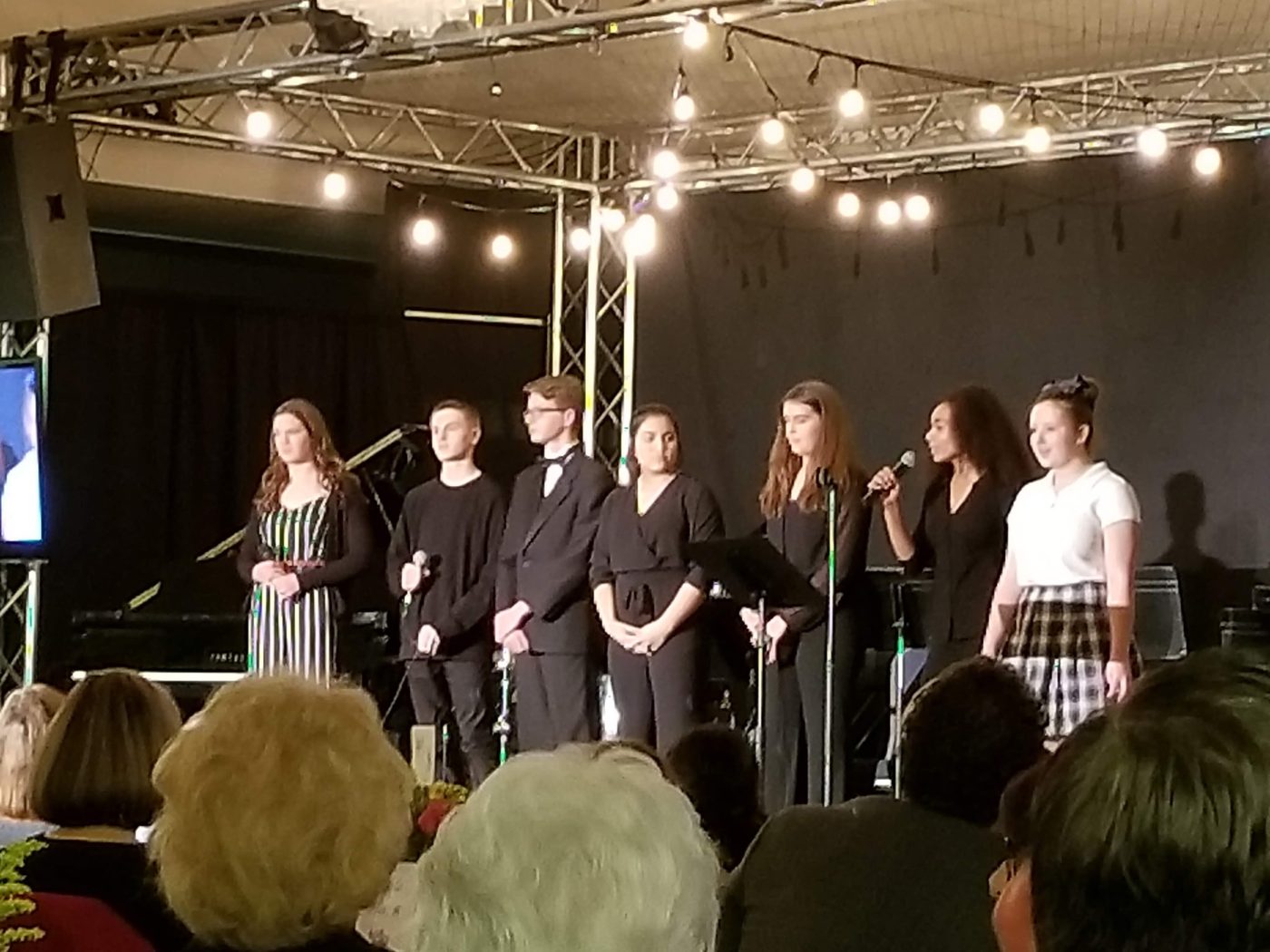 Band performing at an evening event