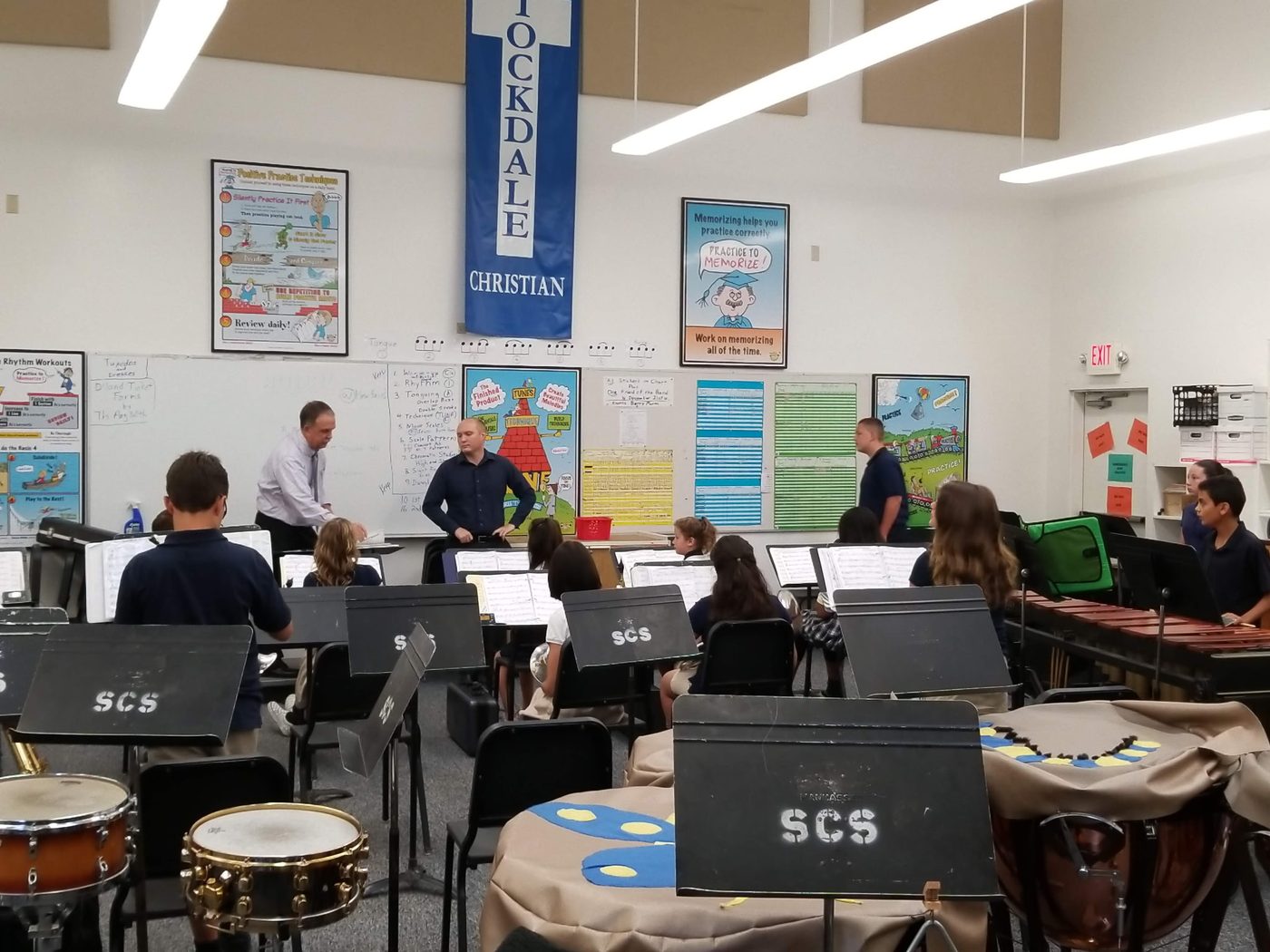 Students with instruments in the band classroom