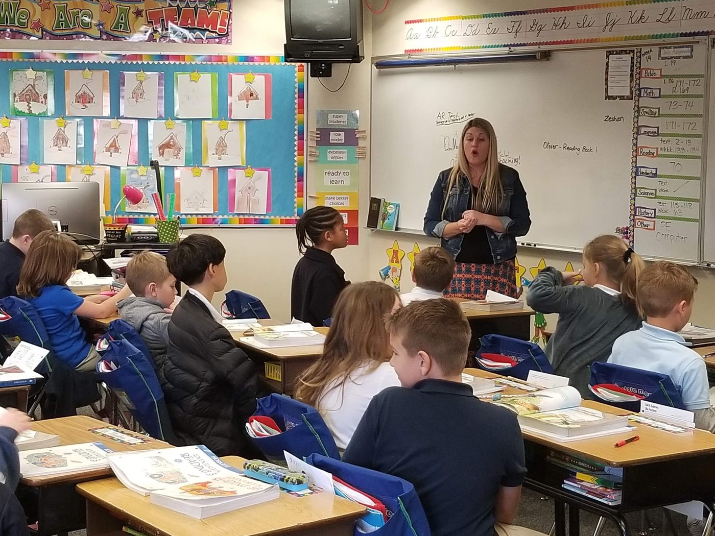 Students reading together in class