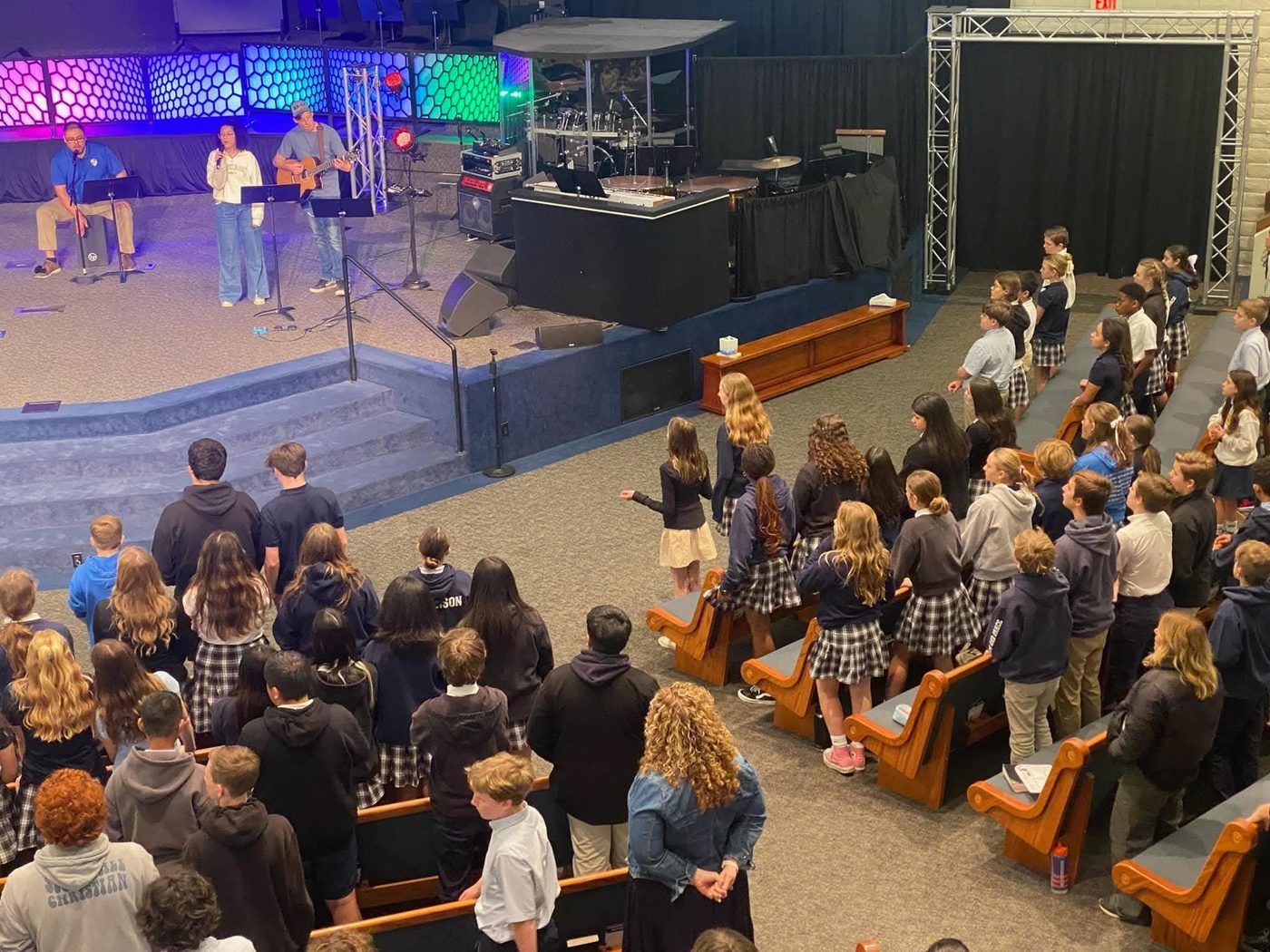 Students and families at a chapel worship service
