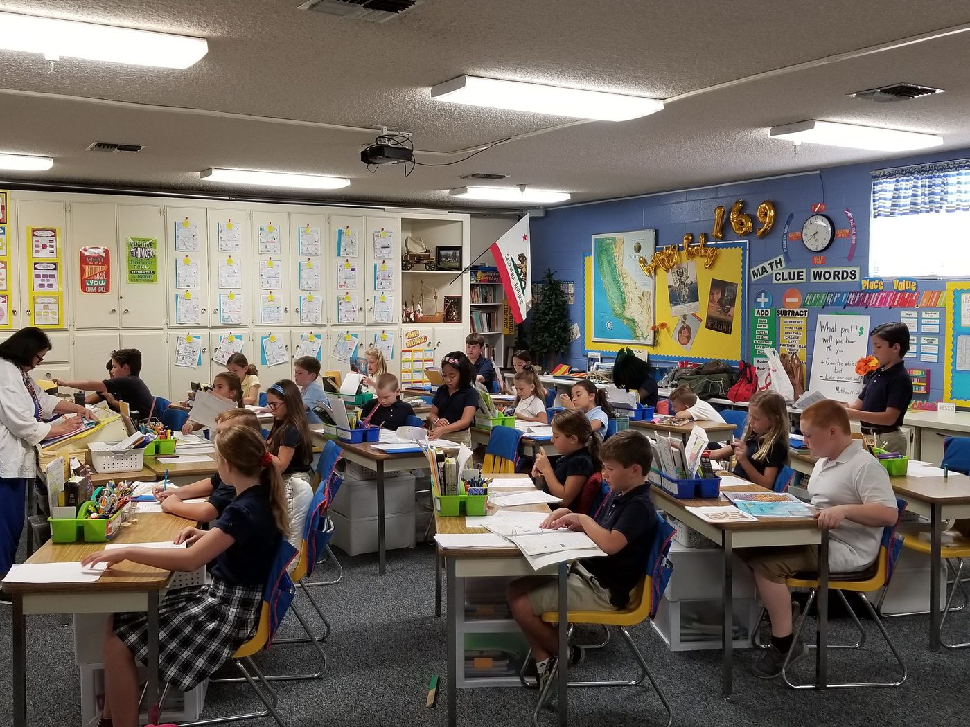 Students working at their desks in class