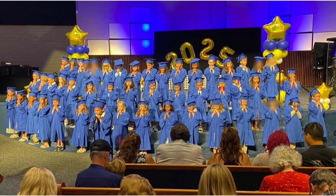 Graduating students on stage
