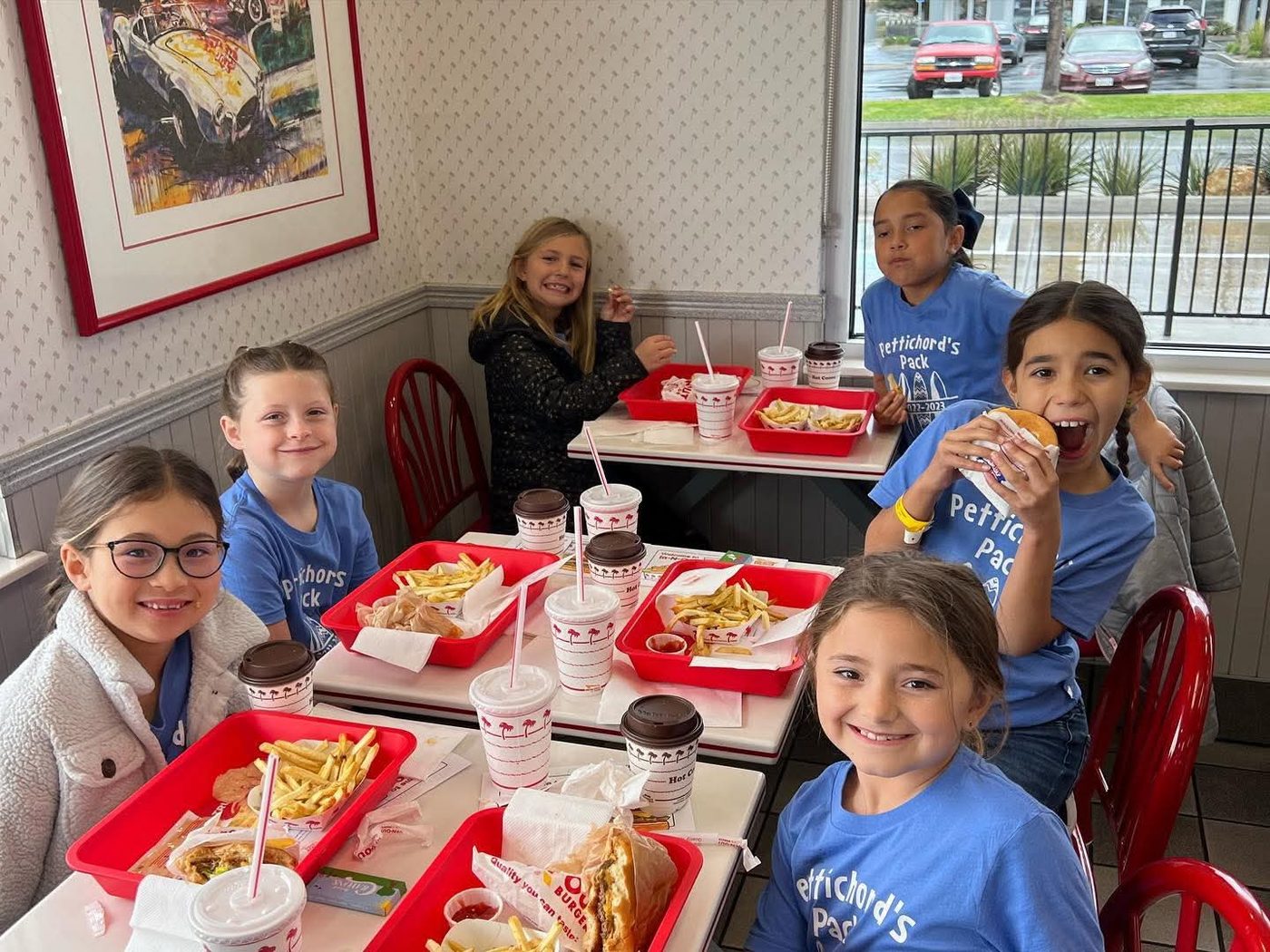 Students enjoying a meal together on a field trip