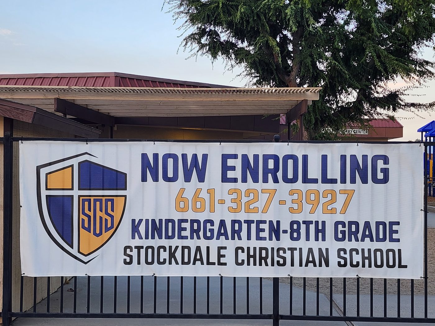 Now enrolling banner, Kindergarten through 8th grade