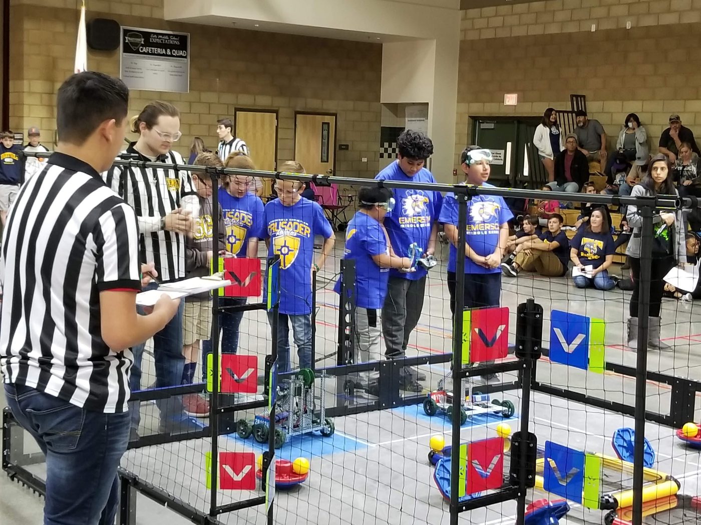 Students competing in a robotics competition